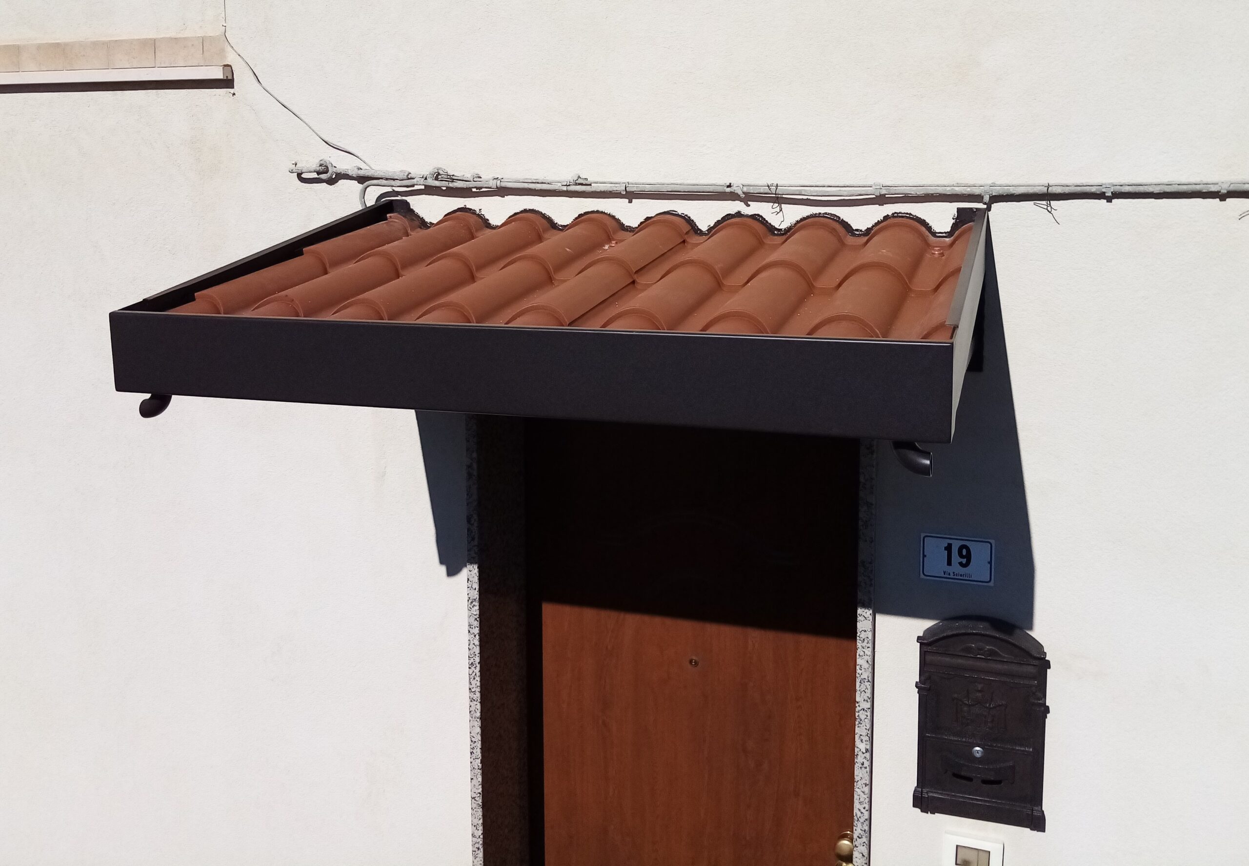 RC-10P – Pensilina con tegole.