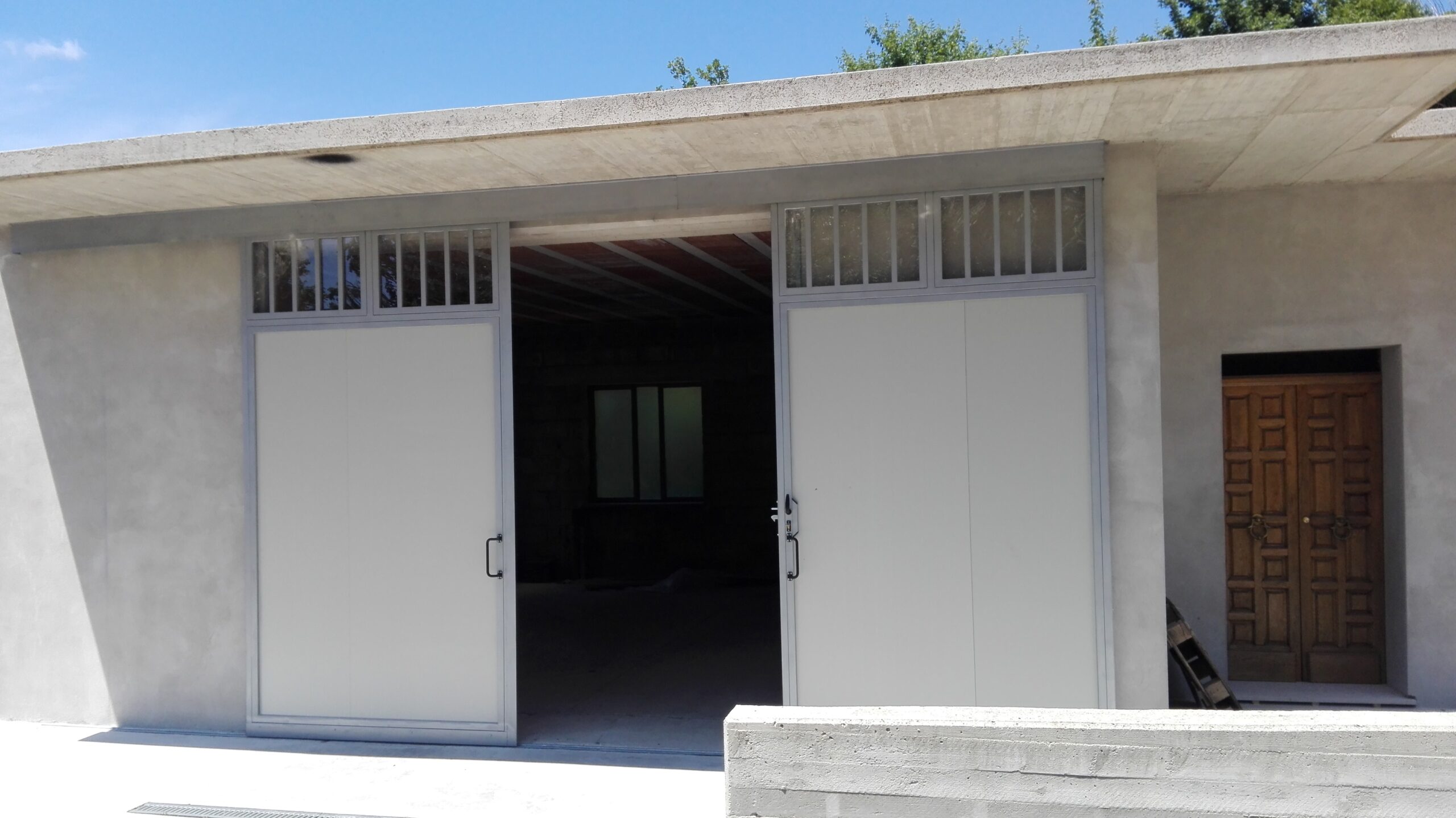 RC-69P – Realizzazione e posa in opera di Porte.